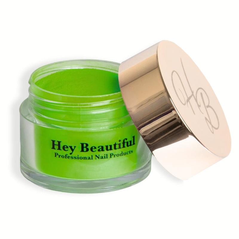 Jar of Bright Green Acrylic Powder with Hey Beautiful’s iconic champagne-colored logo on the cap, emphasizing its stylish packaging.